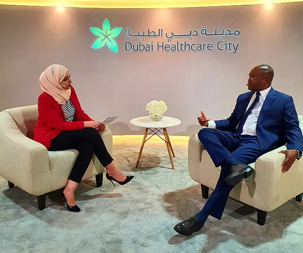 Photo of Moorfields Eye Hospital Dubai Managing Director Elhadi Hassan discussing future of healthcare at Arab Health medical exhibition.
